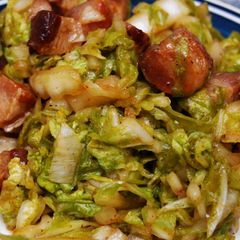 A picture of Wilted Napa Cabbage w/Bacon Lardons.