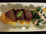 Orange mint Glazed Lamb Loins Fresh Summer Veggies and Creamy L