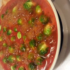 A picture of Brusselsprouts in tomato sauce.