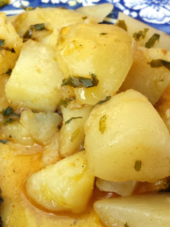 A picture of Potatoes In Beer & Whiskey Sauce.