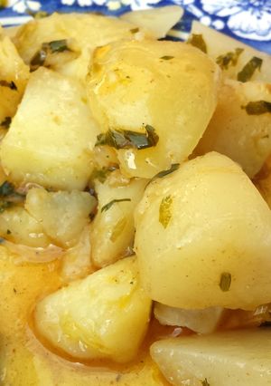 A picture of Potatoes In Beer & Whiskey Sauce.