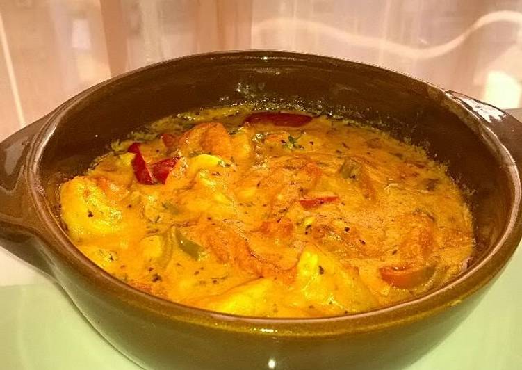 Shrimp baked in tomato and cheese sauce