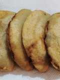 Empanadas rellenas de guiso de hallacas