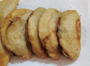 Una foto de Empanadas rellenas de guiso de hallacas