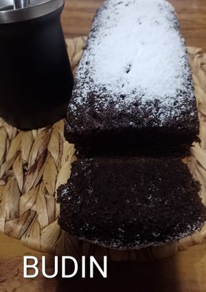 Una foto de Budín de chocolate 🍫 y café ☕