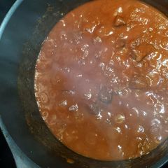 A picture of Goulash with Red Wine.
