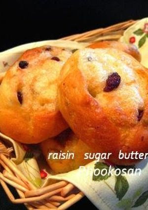 A picture of Raisin Bread Rolls with Sweet Sugar and Butter Topping.