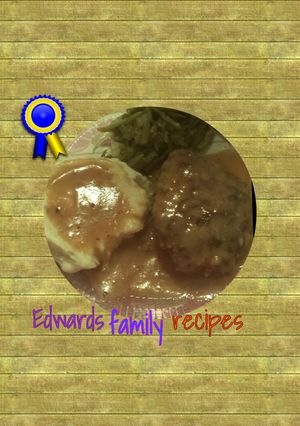 A picture of Salisbury steak and gravy.