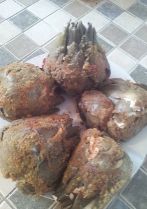 A picture of Muguiro style stuffed artichokes.