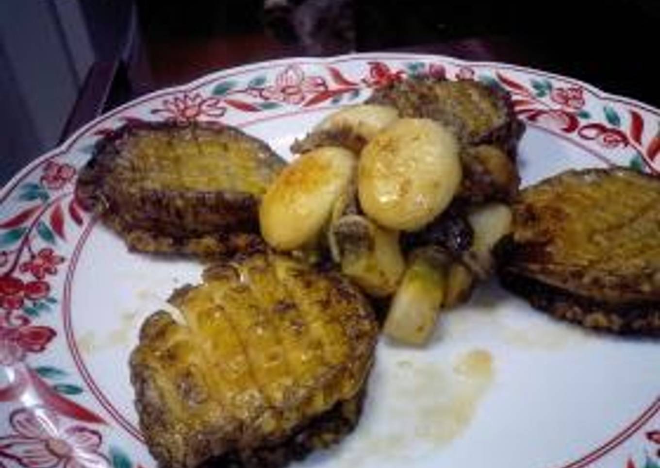 Lightly coat the abalone with oil
