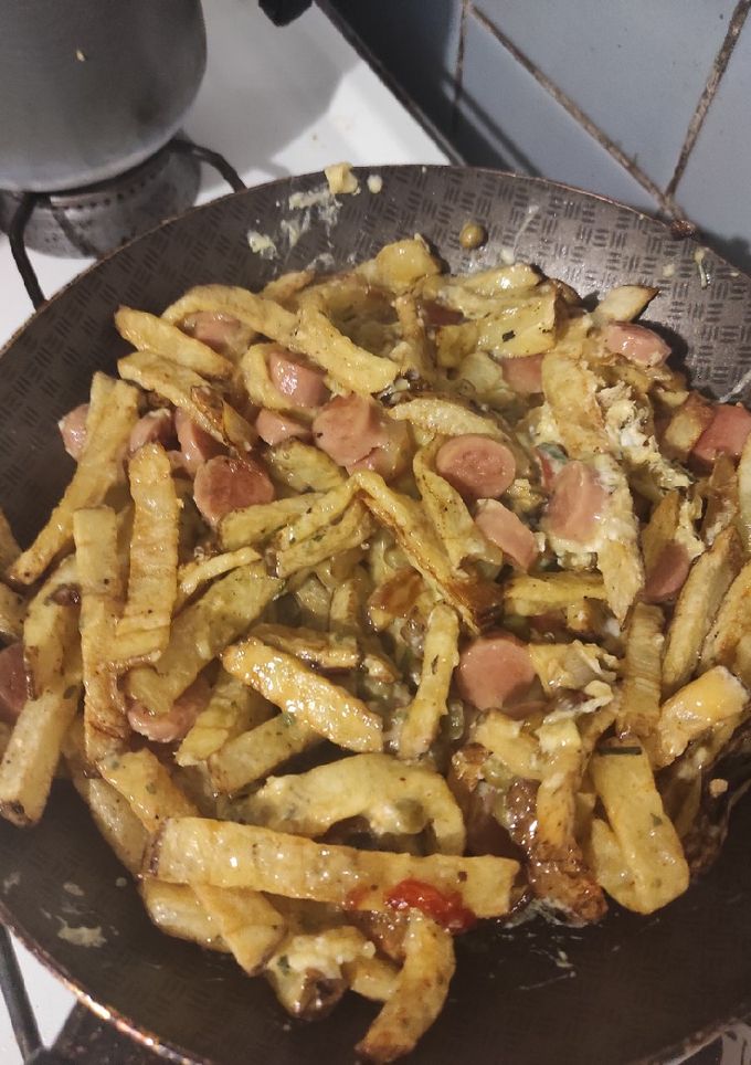 Una foto de Revuelto de gramajo con salchicha