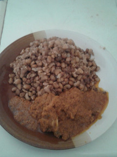 A picture of White beans and tomatoes sauce.