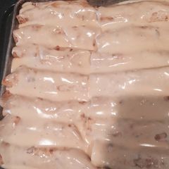 A picture of Cheesy Chicken Enchiladas.