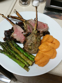 A picture of Rack of Lamb with cherry balsamic sauce.
