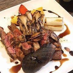 A picture of Beef Steak With 2 Varieties of Sauce.