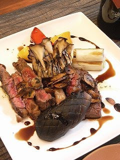 A picture of Beef Steak With 2 Varieties of Sauce.