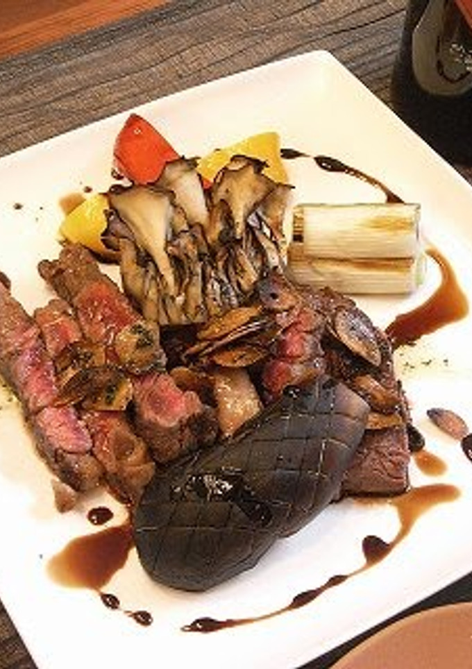 A picture of Beef Steak With 2 Varieties of Sauce.