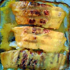 A picture of Salmon with mango sauce.