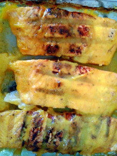 A picture of Salmon with mango sauce.