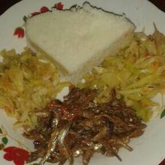 A picture of Ugali with cabbage and omena.