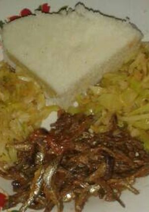 A picture of Ugali with cabbage and omena.