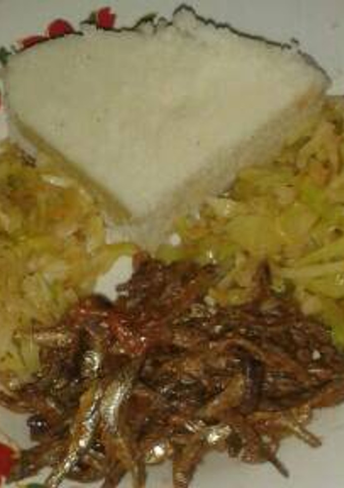 A picture of Ugali with cabbage and omena.