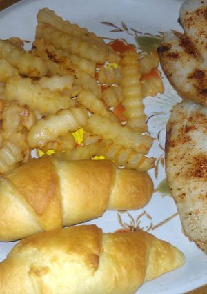 A picture of fish and fries.