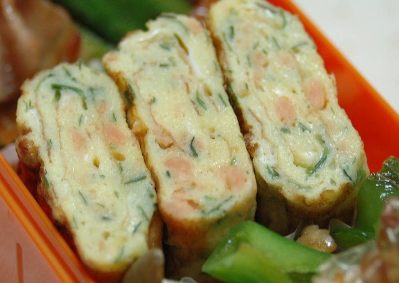 Rolled Omelette with Dried Green Nori Flakes and Salmon Flakes For Lunch Boxes