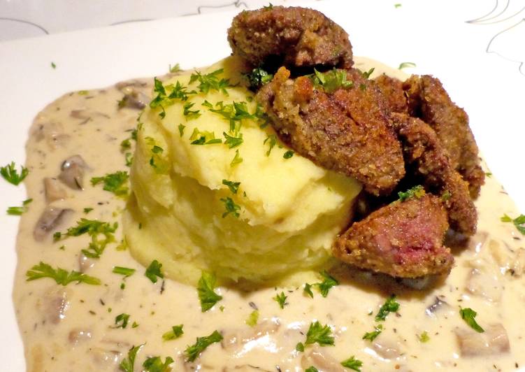 Chicken livers with mushroom sauce on garlic hash