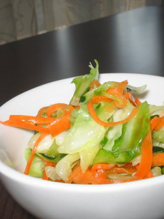 A picture of A Pickled Salad with Delicious Vegetables.