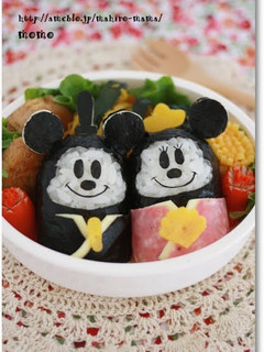 A picture of Doll Festival Bento with Mickey and Minnie Onigiri.