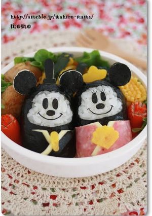 A picture of Doll Festival Bento with Mickey and Minnie Onigiri.