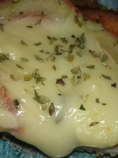 Una foto de Milanesa casera napolitana