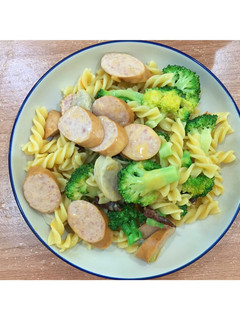 A picture of Fusilli with Sausage in Alaskan Crab Cream Soup Sauce.