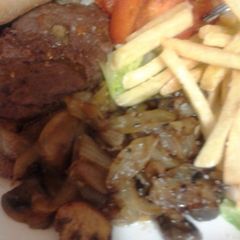 A picture of Gorgeous fried Onions and Mushrooms in garlic butter.