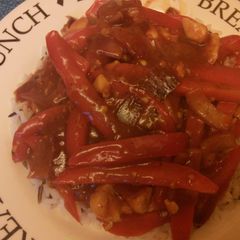 A picture of Sweet `n` sour chicken with rice Chinese style less than 500 calories.