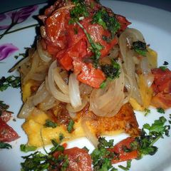 A picture of Griddled Polenta cakes with saffron and tomato relish.