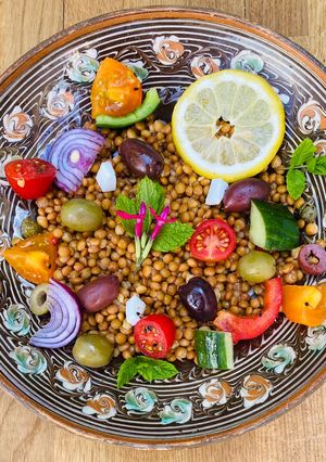 A picture of Greek Fakes Salata - Lentil and Summer Vegetable Salad 🌱.