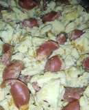 Huevos revueltos con cebolla y salchichas