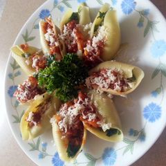 A picture of Manicotti with eggplant sauce.