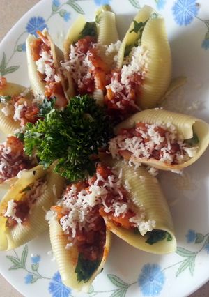 A picture of Manicotti with eggplant sauce.