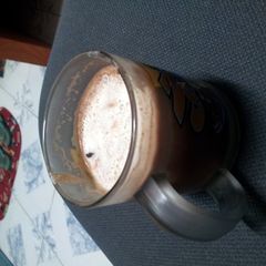 A picture of Cocoa cream with rocksalt and cheese foam.