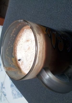 A picture of Cocoa cream with rocksalt and cheese foam.