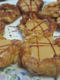 Una foto de Buñuelos barquita rellenos de caramelo