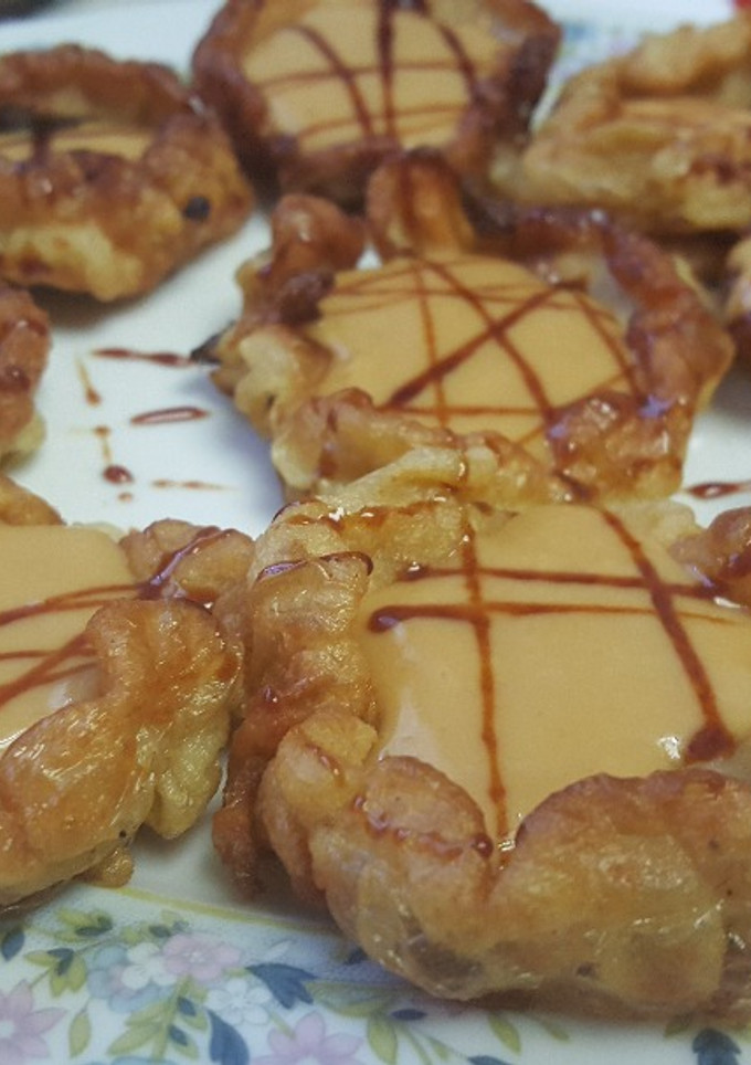 Una foto de Buñuelos barquita rellenos de caramelo 