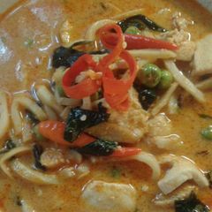 A picture of Thai chicken red curry with bamboo shoot..