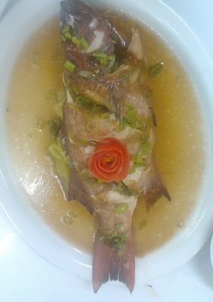 A picture of Steamed whole lapu-lapu w/white Chinese Sauce.