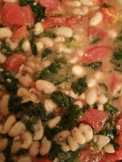 A picture of Garlicky Cannellini Beans with Spinach & Tomatoes.