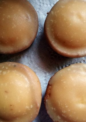 A picture of cupcakes with brown sugar icing.