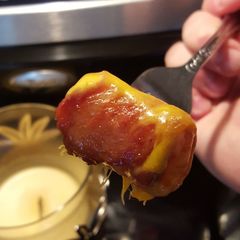 A picture of Cheesy bacon wrapped tots.